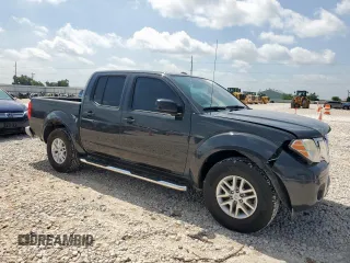 2015 Nissan Frontier SV with VIN 1N6AD0ER7FN728259, listed as a Copart auction lot 65002615 with 133,174 mi miles and Salvage title. Bid and sale history available at DreamBid. Image 4.