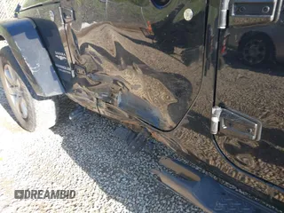 2015 Jeep Wrangler Unlimited Wrangler X with VIN 1C4BJWEG7FL677343, listed as a IAAI auction lot 42147411 with 105,920 mi miles and . Bid and sale history available at DreamBid. Image 19.