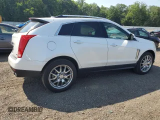 2014 Cadillac SRX Performance Collection with VIN 3GYFNCE38ES629600, listed as a Copart auction lot 61622725 with 86,183 mi miles and Salvage title. Bid and sale history available at DreamBid. Image 3.
