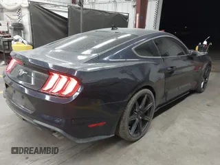 2021 Ford Mustang EcoBoost with VIN 1FA6P8TH0M5110017, listed as a IAAI auction lot 41949095 with 50,321 mi miles and . Bid and sale history available at DreamBid. Image 4.