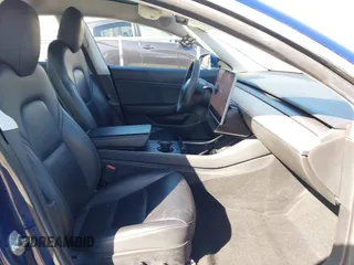 2019 Tesla Model 3 Mid Range with VIN 5YJ3E1EA8KF436086, listed as a IAAI auction lot 41682093 with 70,332 mi miles and . Bid and sale history available at DreamBid. Image 5.