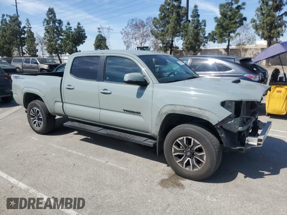 2022 Toyota Tacoma SR5 with VIN 3TMBZ5DN9NM033861, listed as a Copart auction lot 53704065 with 55,386 mi miles and Salvage title. Bid and sale history available at DreamBid. Image 4.