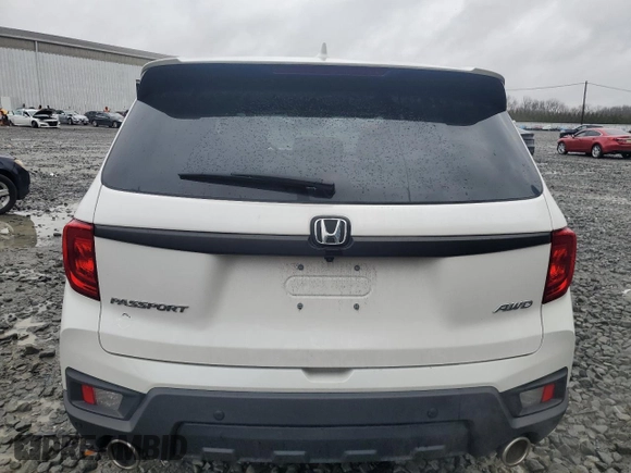 2023 Honda Passport EX-L z VIN 5FNYF8H59PB041173, wystawiony jako Copart lot #48941105 z przebiegiem 24 973 mil mil oraz Szkoda całkowita • Salvage title. Historia ofert i sprzedaży dostępna na DreamBid. Obrazek 6.