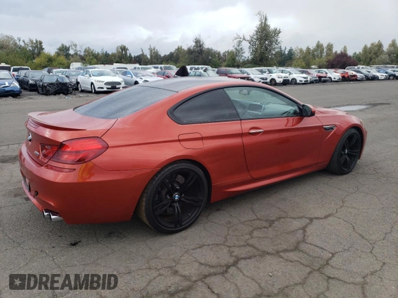 2014 BMW M6 z VIN WBSLX9C52ED160071, wystawiony jako Copart lot #77452554 z przebiegiem 64 814 mil mil oraz Szkoda całkowita • Salvage title. Historia ofert i sprzedaży dostępna na DreamBid. Obrazek 3.