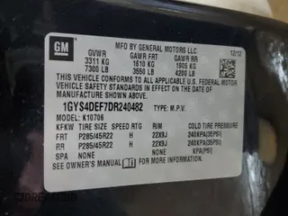2013 Cadillac Escalade Platinum Edition z VIN 1GYS4DEF7DR240482, wystawiony jako Copart lot #56906815 z przebiegiem 147 774 mil mil oraz Szkody całkowita. Historia ofert i sprzedaży dostępna na DreamBid. Obrazek 13.