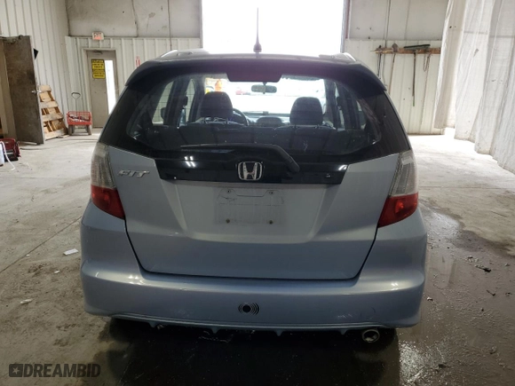 2009 Honda Fit Sport w/Navi with VIN JHMGE88639S042492, listed as a Copart auction lot 50890105 with 132,339 mi miles and Salvage Title. Bid and sale history available at carsss.com. Image 6.