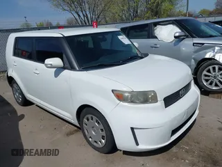 2009 Scion xB with VIN JTLKE50E691075560, listed as a IAAI auction lot 42009258 with 212,173 mi miles. Bid and sale history available at carsss.com. Image 1.