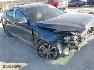 2015 Kia Optima EX with VIN 5XXGN4A71FG426726, listed as a IAAI auction lot 41341272 with 114,298 mi miles. Bid and sale history available at carsss.com. Image 1.