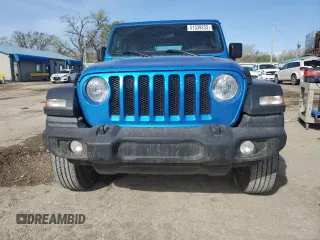 2023 Jeep Wrangler Sport S with VIN 1C4HJXDN3PW503284, listed as a Copart auction lot 51539255 with 31,856 mi miles and Salvage title. Bid and sale history available at DreamBid. Image 5.