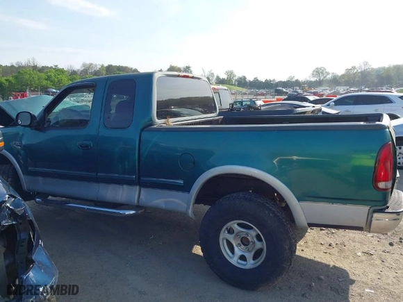 1998 Ford F-150 Standard with VIN 1FTZX18W6WNA42055, listed as a IAAI auction lot 41892362 with 138,225 mi miles. Bid and sale history available at carsss.com. Image 13.
