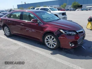 2015 Toyota Avalon Limited with VIN 4T1BK1EB8FU181008, listed as a IAAI auction lot 41850174 with 71,921 mi miles and . Bid and sale history available at DreamBid. Image 1.