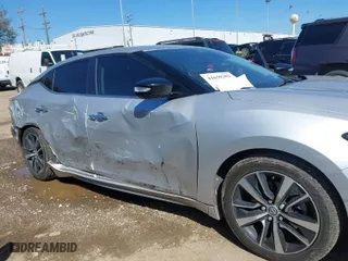 2021 Nissan Maxima SV with VIN 1N4AA6CV0MC501153, listed as a IAAI auction lot 41650382 with 56,686 mi miles. Bid and sale history available at carsss.com. Image 6.