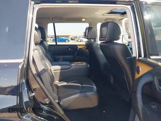 2014 Infiniti QX80 z VIN JN8AZ2NF2E9553274, wystawiony jako IAAI lot #41964242 z przebiegiem 95 667 mil mil oraz . Historia ofert i sprzedaży dostępna na DreamBid. Obrazek 8.