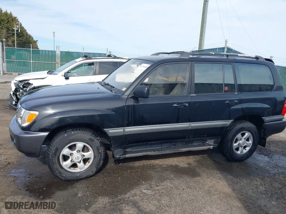 1998 Toyota Land Cruiser with VIN JT3HT05J2W0017214, listed as a IAAI auction lot 41716028 with 214,047 mi miles. Bid and sale history available at carsss.com. Image 15.