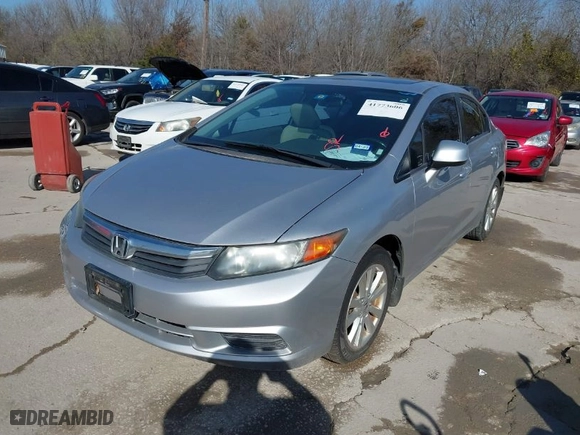 2012 Honda Civic Sdn EX-L with VIN 19XFB2F9XCE324560, listed as a IAAI auction lot 41773606 with 115,377 mi miles. Bid and sale history available at carsss.com. Image 2.