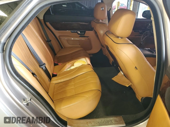 2013 Jaguar XJ with VIN SAJWJ1CD1D8V51462, listed as a Copart auction lot 50527985 with 62,995 mi miles and Salvage title. Bid and sale history available at DreamBid. Image 10.