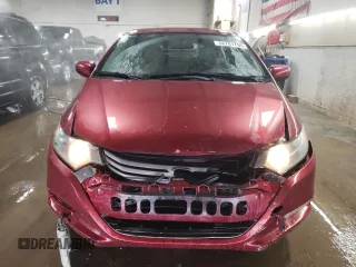 2010 Honda Insight LX with VIN JHMZE2H52AS034613, listed as a Copart auction lot 52701795 with 232,541 mi miles and Salvage Title. Bid and sale history available at DreamBid. Image 5.