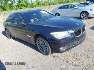 2011 BMW 7 Series 740i with VIN WBAKA4C52BC392112, listed as a IAAI auction lot 41736939 with 125,953 mi miles. Bid and sale history available at carsss.com. Image 1.