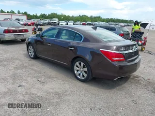 2015 Buick LaCrosse Leather with VIN 1G4GB5G38FF152910, listed as a IAAI auction lot 42625459 with 172,380 mi miles and . Bid and sale history available at DreamBid. Image 3.