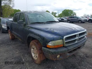 2004 Dodge Dakota Sport with VIN 1D7HL38K34S782067, listed as a IAAI auction lot 42012642 with 113,921 mi miles. Bid and sale history available at carsss.com. Image 1.
