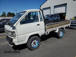 1994 Toyota Tacoma with VIN CM600012981, listed as a Copart auction lot 64052155 with 237,536 mi miles and Salvage title. Bid and sale history available at DreamBid. Image 1.