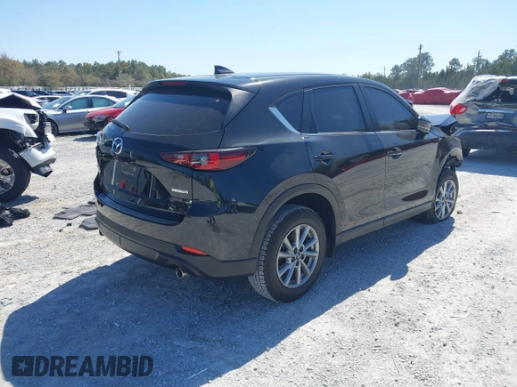 2023 Mazda CX-5 2.5 S with VIN JM3KFBAM3P0244974, listed as a IAAI auction lot 41748896 with 21,387 mi miles. Bid and sale history available at carsss.com. Image 4.