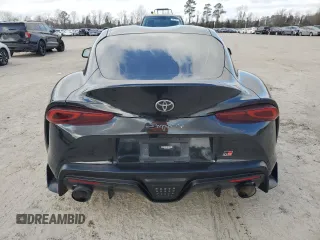 2021 Toyota GR Supra 2.0 with VIN WZ1DB2C02MW045335, listed as a Copart auction lot 44009215 with 37,882 mi miles and Salvage Title. Bid and sale history available at carsss.com. Image 6.