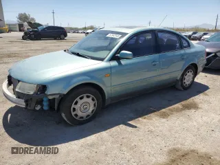 1999 Volkswagen Passat GL z VIN WVWMD63BXXE058992, wystawiony jako Copart lot #57342545 z przebiegiem 89 523 mil mil oraz Szkoda całkowita • Salvage title. Historia ofert i sprzedaży dostępna na DreamBid. Obrazek 1.