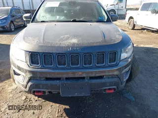 2017 Jeep Compass Trailhawk with VIN 3C4NJDDB8HT666169, listed as a IAAI auction lot 41434519 with 143,263 mi miles and . Bid and sale history available at DreamBid. Image 12.