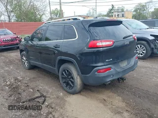 2014 Jeep Cherokee Latitude with VIN 1C4PJMCS0EW208092, listed as a IAAI auction lot 42174675 with 202,871 mi miles and . Bid and sale history available at carsss.com. Image 3.