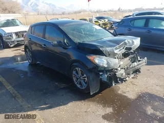 2016 Kia Forte 5-Door EX with VIN KNAFX5A80G5605234, listed as a IAAI auction lot 41443617 with 87,333 mi miles. Bid and sale history available at carsss.com. Image 1.