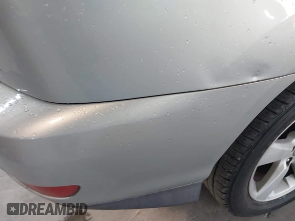 2004 Lexus RX 330 z VIN JTJGA31UX40018944, wystawiony jako IAAI lot #42219158 z przebiegiem 266 762 mil mil oraz . Historia ofert i sprzedaży dostępna na DreamBid. Obrazek 16.