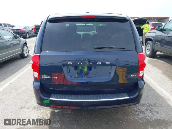 2015 Dodge Grand Caravan SXT with VIN 2C4RDGCG7FR524712, listed as a IAAI auction lot 41956063 with 111,144 mi miles and . Bid and sale history available at DreamBid. Image 16.