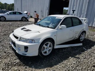 1998 Mitsubishi Lancer z VIN 000000CP9A0001997, wystawiony jako Copart lot #68862654 z przebiegiem 164 292 mil mil oraz Szkoda całkowita • Salvage title. Historia ofert i sprzedaży dostępna na DreamBid. Obrazek 1.
