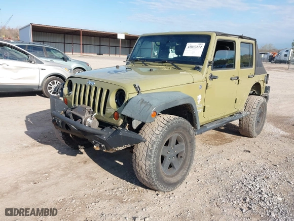 2013 Jeep Wrangler Unlimited Sport with VIN 1C4BJWDG5DL577949, listed as a IAAI auction lot 41837172 with 142,235 mi miles. Bid and sale history available at carsss.com. Image 17.