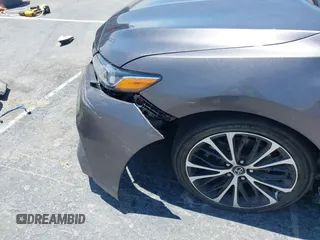 2019 Toyota Camry LE z VIN 4T1B11HK5KU833141, wystawiony jako IAAI lot #42489827 z przebiegiem 24 258 mil mil oraz . Historia ofert i sprzedaży dostępna na DreamBid. Obrazek 17.
