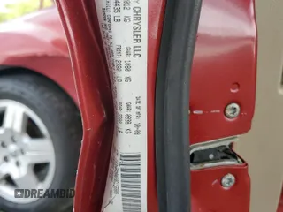 2009 Dodge Caliber SXT z VIN 1B3HB48A29D156808, wystawiony jako Copart lot #52732095 z przebiegiem 99 613 mil mil oraz Szkoda całkowita • Salvage title. Historia ofert i sprzedaży dostępna na DreamBid. Obrazek 13.