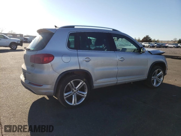 2016 Volkswagen Tiguan R-Line with VIN WVGBV7AX9GW082750, listed as a Copart auction lot 42949505 with 106,243 mi miles and Salvage Title. Bid and sale history available at DreamBid. Image 3.