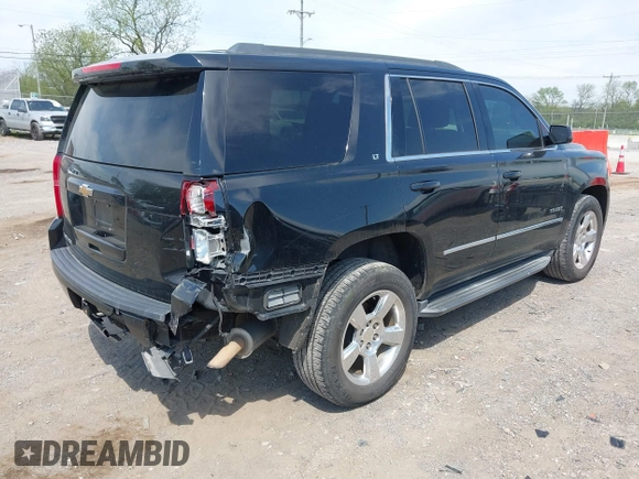 2015 Chevrolet Tahoe LT with VIN 1GNSCBKC9FR679748, listed as a IAAI auction lot 42018017 with 224,264 mi miles and . Bid and sale history available at DreamBid. Image 4.