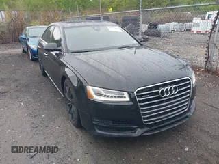 2017 Audi A8 z VIN WAU44AFD6HN018343, wystawiony jako IAAI lot #42327052 z przebiegiem 180 735 mil mil oraz . Historia ofert i sprzedaży dostępna na DreamBid. Obrazek 1.