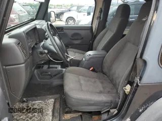 2003 Jeep Wrangler Sport z VIN 1J4FA49S13P374688, wystawiony jako Copart lot #58296735 z przebiegiem 184 554 mil mil oraz Czysty tytuł • Clean title. Historia ofert i sprzedaży dostępna na DreamBid. Obrazek 7.