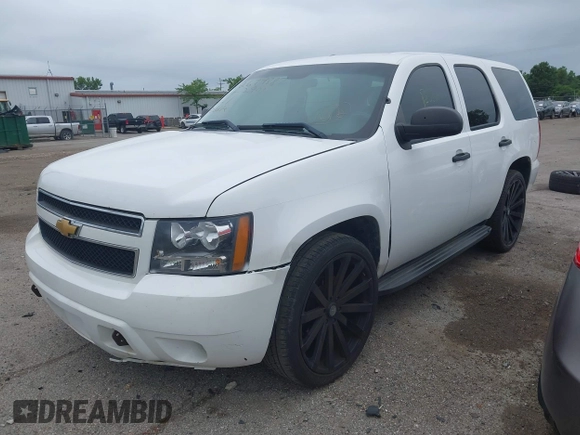2012 Chevrolet Tahoe Commercial with VIN 1GNLC2E02CR322901, listed as a IAAI auction lot 42679887 with 251,794 mi miles and . Bid and sale history available at DreamBid. Image 18.
