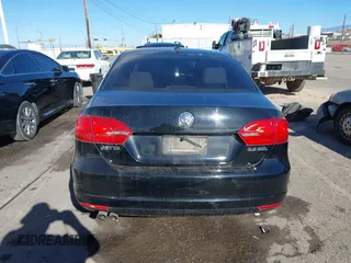 2012 Volkswagen Jetta Sedan SEL w/Sunroof with VIN 3VWLX7AJ1CM376990, listed as a IAAI auction lot 41206594 with 50,906 mi miles. Bid and sale history available at carsss.com. Image 16.