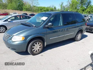 2007 Chrysler Town & Country LWB Touring with VIN 2A4GP54L47R167189, listed as a IAAI auction lot 42143590 with 165,547 mi miles. Bid and sale history available at carsss.com. Image 2.