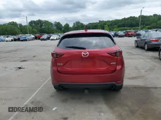 2018 Mazda CX-5 Grand Touring with VIN JM3KFADM8J0444455, listed as a Copart auction lot 59793055 with 60,839 mi miles and Salvage title. Bid and sale history available at DreamBid. Image 6.