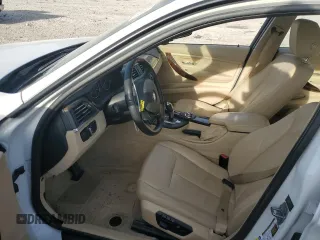 2013 BMW 3 Series 328i with VIN WBA3A5G58DNP19821, listed as a Copart auction lot 55409755 with 110,257 mi miles and Salvage Title. Bid and sale history available at DreamBid. Image 7.