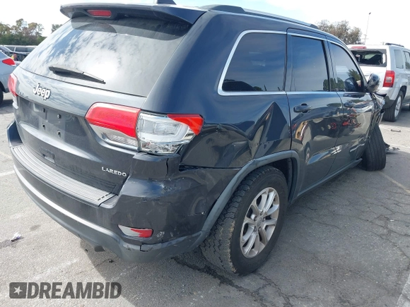 2015 Jeep Grand Cherokee Altitude with VIN 1C4RJEAG8FC669119, listed as a IAAI auction lot 41724699 with 159,902 mi miles. Bid and sale history available at carsss.com. Image 4.