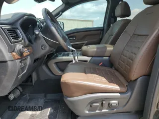 2023 Nissan Titan Platinum Reserve with VIN 1N6AA1EDXPN106467, listed as a Copart auction lot 53455215 with 56,061 mi miles and Salvage title. Bid and sale history available at DreamBid. Image 7.