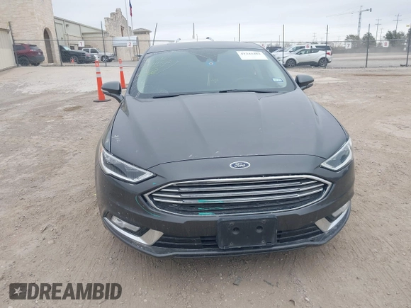 2017 Ford Fusion Titanium with VIN 3FA6P0SU8HR104727, listed as a IAAI auction lot 41242482 with 83,021 mi miles and . Bid and sale history available at DreamBid. Image 13.