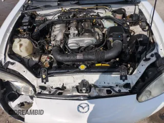 2002 Mazda MX-5 Miata Cloth z VIN JM1NB353X20229549, wystawiony jako Copart lot #54549205 z przebiegiem 79 871 mil mil oraz Szkoda całkowita • Salvage title. Historia ofert i sprzedaży dostępna na DreamBid. Obrazek 11.